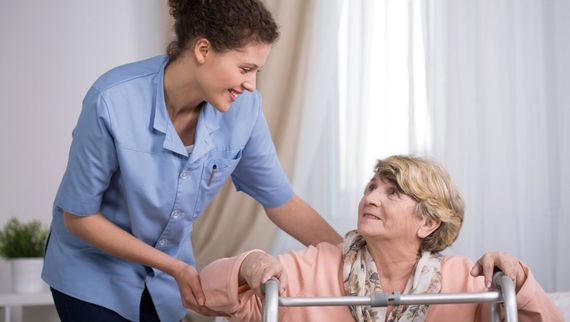 A trained nurse checking on a resident